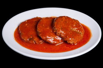 Cutlets in tomato sauce