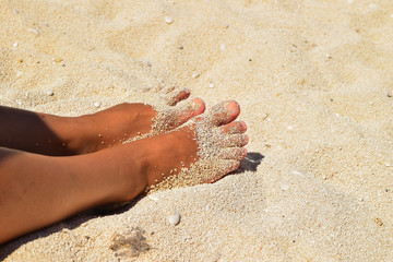 feet on the beach