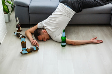 Coronavirus Quarantine Lifestyle. Man Sleeping Lying on the floor At Home During Pandemic Self-Isolation. Panorama