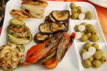 Antipasto on plate with eggplant and olives