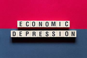 Economic depression word concept on cubes