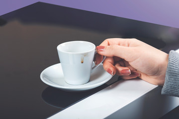 mid adult woman drinking coffee and reading news. Horizontal shape, copy space