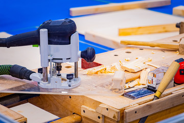 Woodworking. Joinery. Equipment for wood processing. Furniture production. The workplace of the joiner. Woodworking as a hobby. Processing of natural materials.Equipment woodworking workshop.