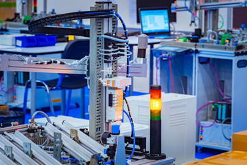 Robotics. Laboratory for programming industrial robots. Writing programs for robots. Production automation. Robots for production. Engineering laboratory. Software.