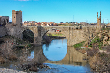 Medieval Alcantara bridge in Toledo. Castilla la Mancha. Spain
