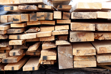 stacked lumber from the end