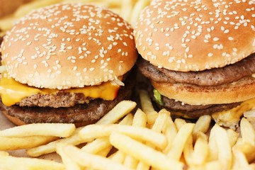 Beef burgers and French fries in the cafe 