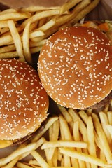 Beef burgers and French fries in the cafe 