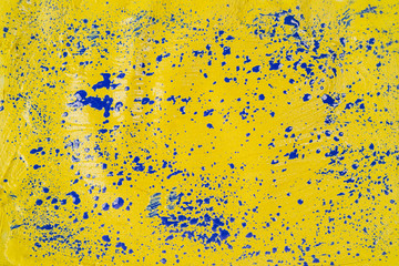 A beautiful Yellow and Blue paint texture on wall, background - Image. Color paint strokes.