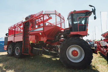 red sugar beet harvester at summer exhibition