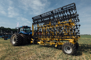 mechanical device for cultivating agricultural land arable land plow in the field in summer
