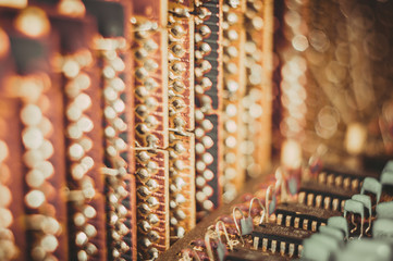Vintage electronic circuit boards with radio parts and chips, close-up, macro photo