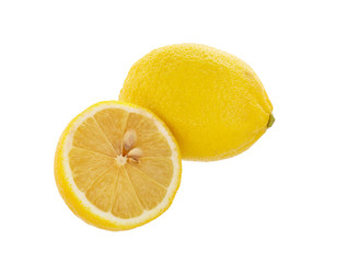 Ripe juicy lemon fruit and half isolated.