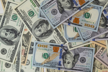 Background with money of american hundred dollar and other notes.