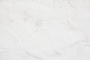 Closeup white blank plaster painted wall with rough surface texture background. - obrazy, fototapety, plakaty