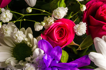 Background for a greeting card - beautiful gift bouquet of various colorful decorative summer flowers