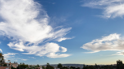 Partly cloudy sky at midday