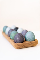 10 eggs in wooden holder 