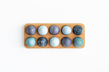 10 blue and black colored Easter eggs