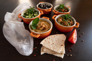 Focus on small summer salads with chickpeas, tomato, cucumber and mint