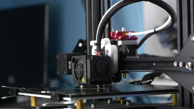 4K The 3D printer starts to print white plastic model. modern technology.