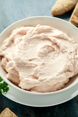 Taramasalata dip made with fish roe in white bowl
