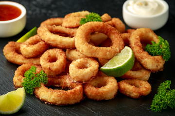 Oven baked breaded calamari rings served with lime wedges, sweet chilli sauce and mayonnaise