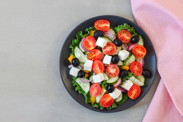 Green salad with tomato and fresh vegetables