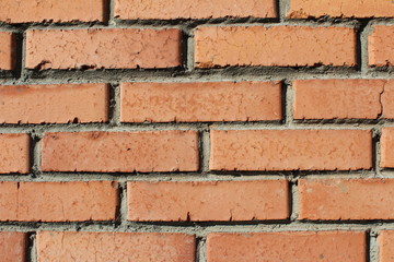 Obraz premium Brick background. Orange brick background. Loft style