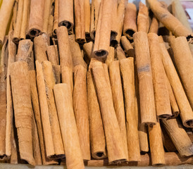Dried cinnamon bark. Selling a crop in the market. Natural, healthy, vitamin-rich foods. Food for...