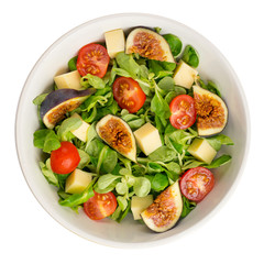Fresh salad with figs, leaves, cherry tomatoes and cheese on white background. Food concept. Top view.