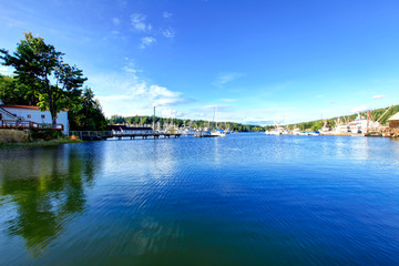 Fototapeta na wymiar Gig Harbor downtown with water, boats, small town, buildings. State Washington, USA.