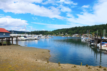 Gig Harbor downtown with water, boats, small town, buildings. State Washington, USA.