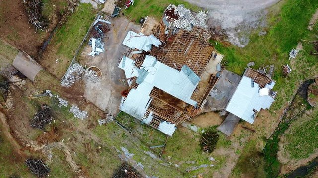 Aerial, Rising, Drone Shot, Top Down Above A Tornado Aftermath, Collapsed Building, In Middle Of Ripped Trees And Storm Damage, In Nashville, Tennessee, USA