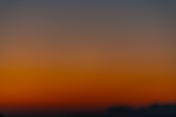 Sky gradient from blue to orange sunset