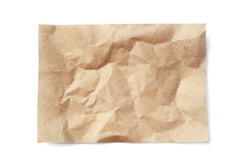 Crumpled beige paper sheet isolated on white background