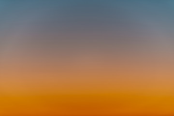 Obraz premium Sky gradient from blue to orange sunset