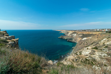 Fototapeta na wymiar Beautiful azure sea near the mountain coast. Cape Fiolent, Sevastopol