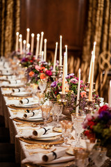 Elegany high end diner setup with golden cutlery