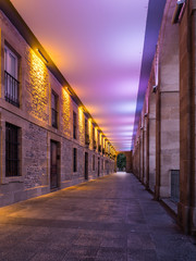 Colorful illumination of the Los Arquillos passageway in Vitoria-Gasteiz, Basque Country, Spain