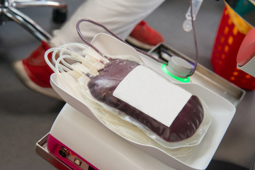 Blood transfusion. Red blood bag in laboratory. Blood donor at donation, transfusion.
