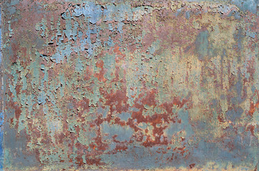Painted metal with cracks in the paint, roughness, rust. Iron sheet covered with old paint, which has cracked from time and weather conditions. Metal background, texture, backdrop.