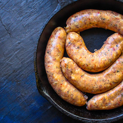 meat sausages,
grilled meat with spices
barbecue raw preparation,
Menu concept food background keto or paleo diet. top view. copy space for text 