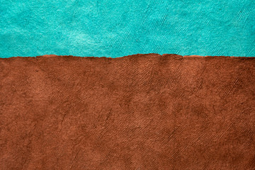 brown field and turquoise blue sky  abstract paper landscape