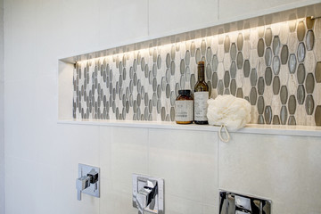 Stunning walk-in shower with white tile surround. Luxury American modern home. - obrazy, fototapety, plakaty