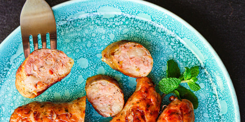 fried sausages, grilled meat or barbecue Menu concept, food background, keto or paleo diet. top view. copy space for text 