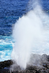 Water bursts through blowhole on Espanola Island, Galapagos National park, Ecuador.