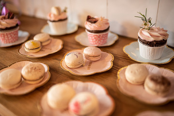 Beautiful table set for an event party or wedding reception . restaurant interior cakes on table