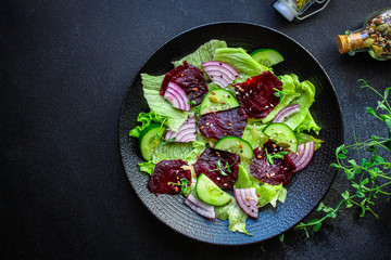 healthy salad
beetroot slices, iceberg lettuce, greens.
Menu concept food background, keto or paleo diet. top view. copy space for text
