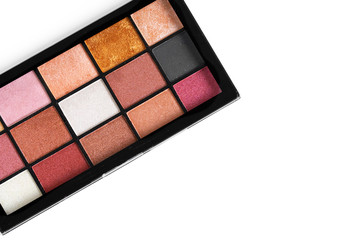 Make up colorful eyeshadow palettes on white, close up